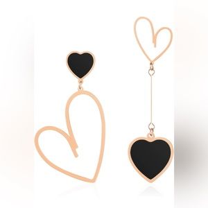 Stunning Mismatched Heart Dangle Earrings are sure to grab hearts and turn heads